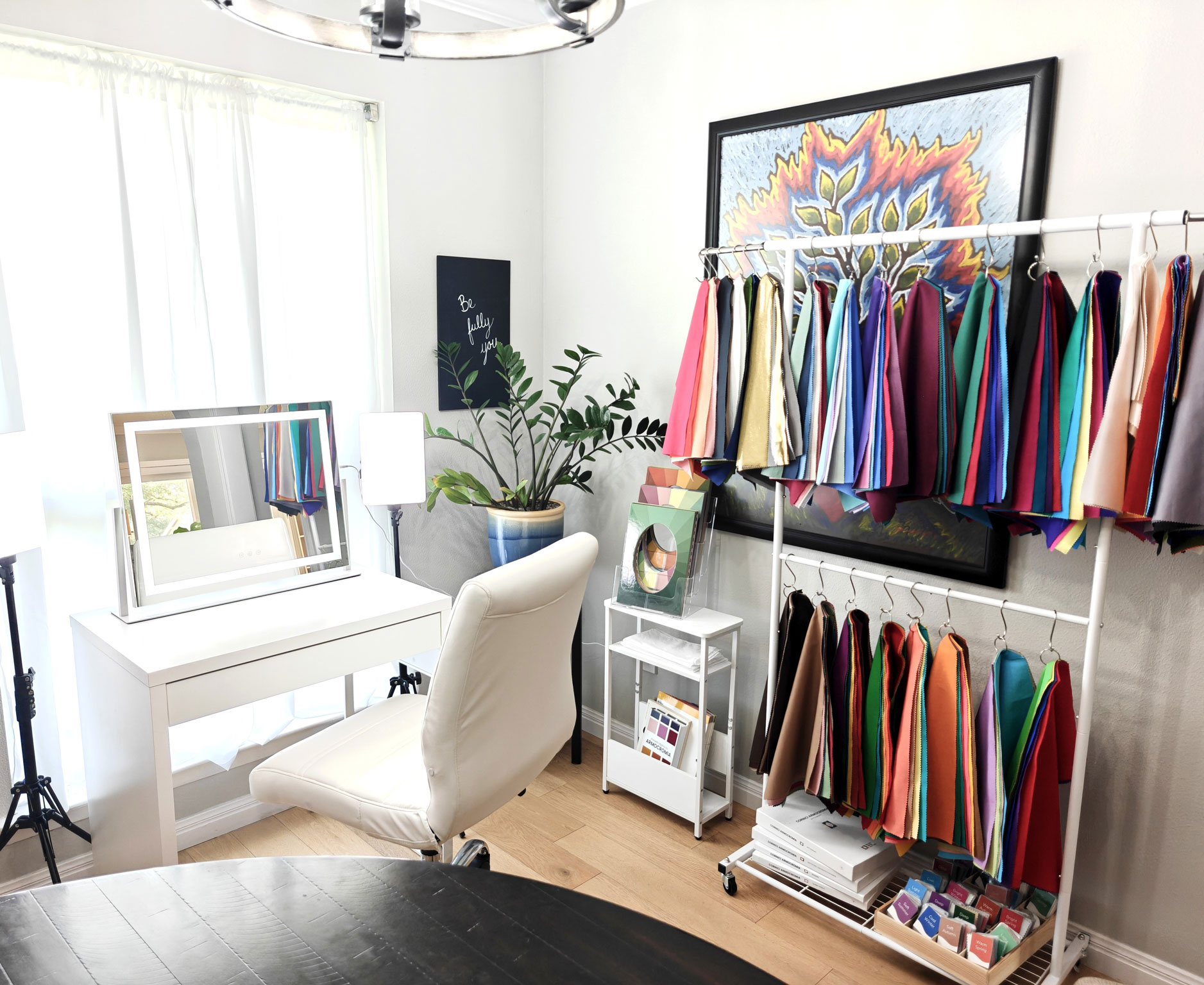 Color Harmony Studio interior with swatch racks, chair and mirror